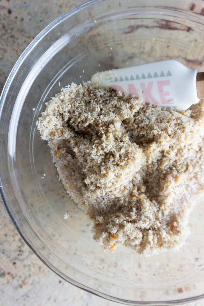 Combining dough for orange chocolate macaroons