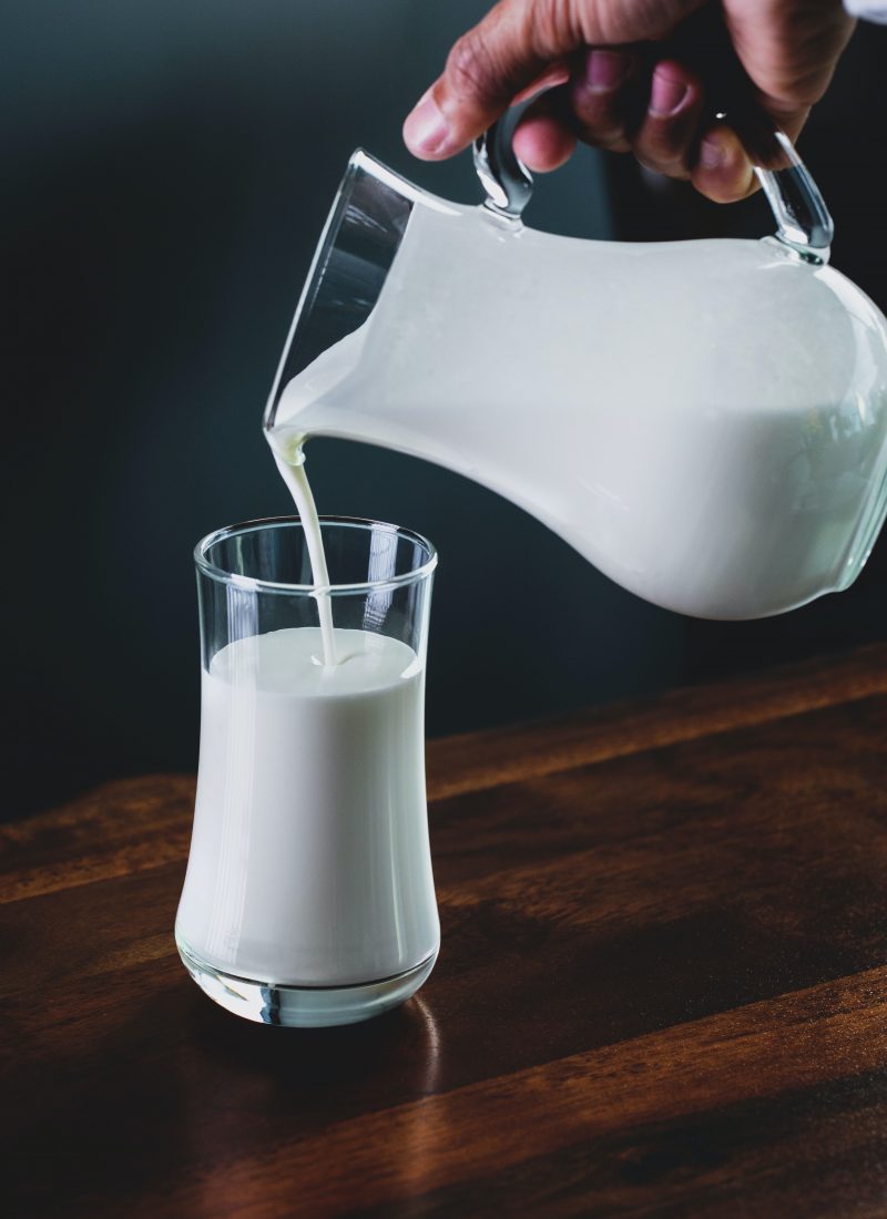 Milk being filled into a glass
