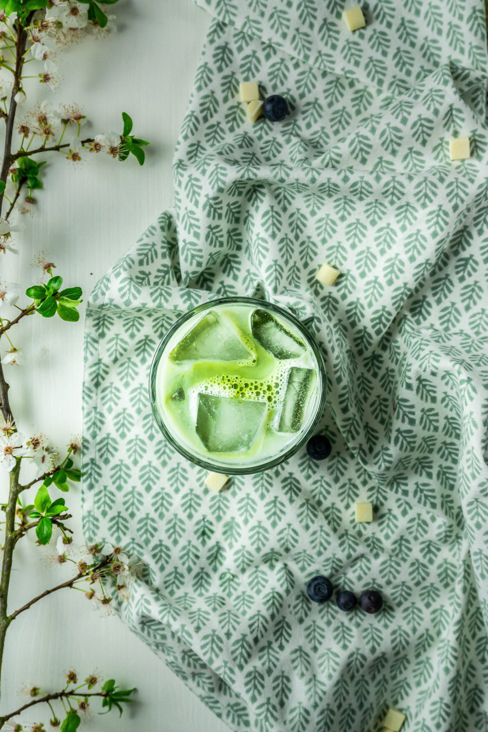 Iced Matcha Latte, photographed from above in order to show off the vibrant green colours
