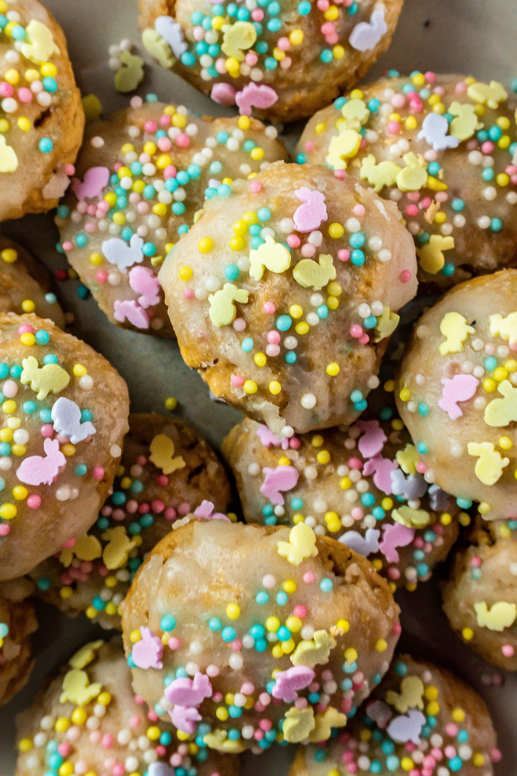 Italian Easter Cookies, photographed from above, decorated with icing sugar and sprinkles