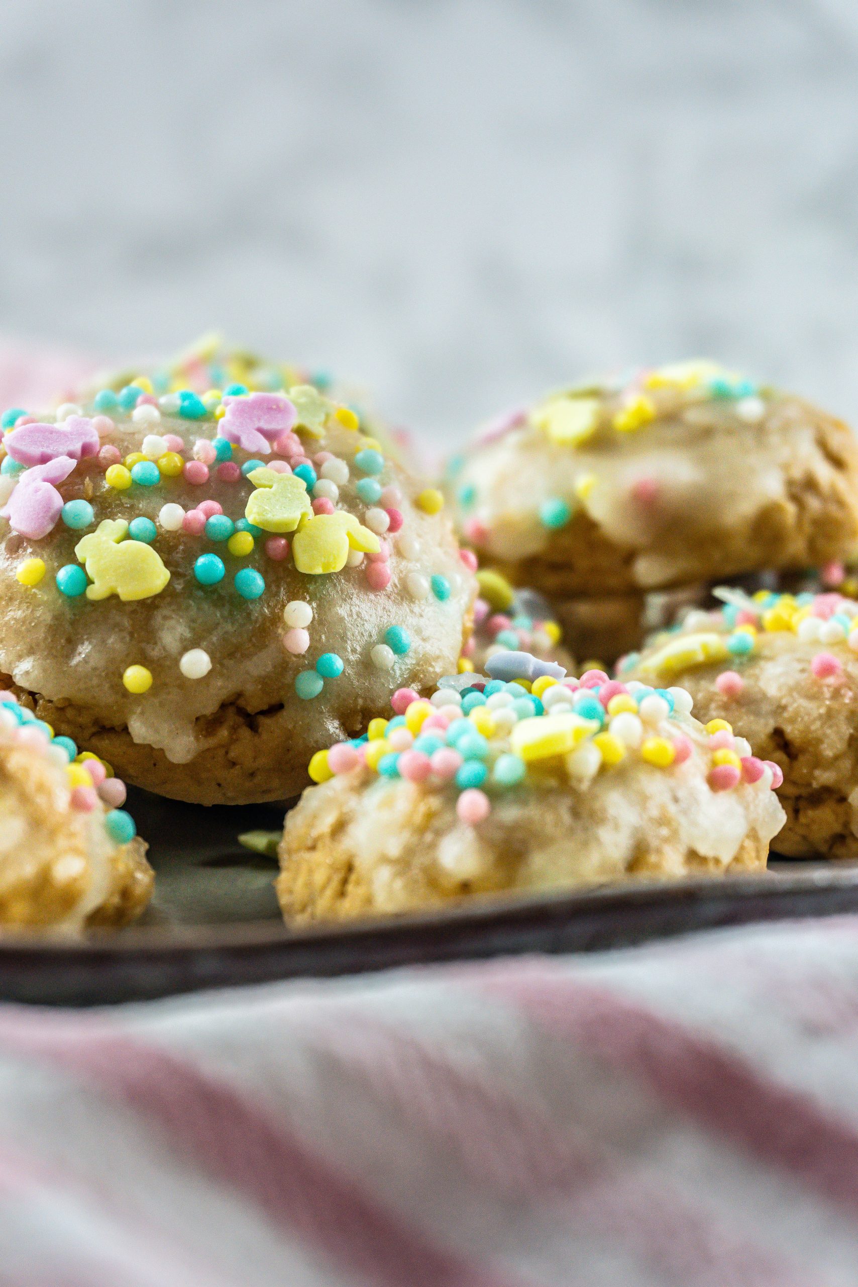 Italian Easter Cookies with icing and sprinkles, photographed up close
