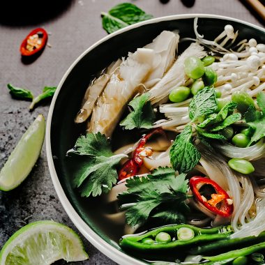 Different legumes in a bowl of pho