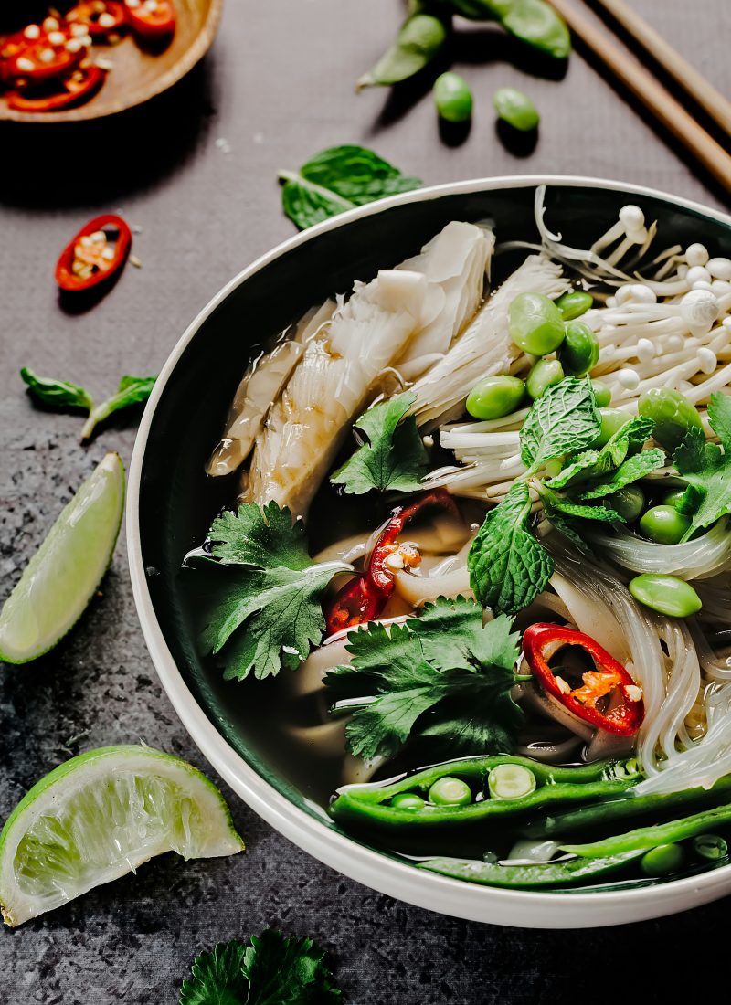 Different legumes in a bowl of pho