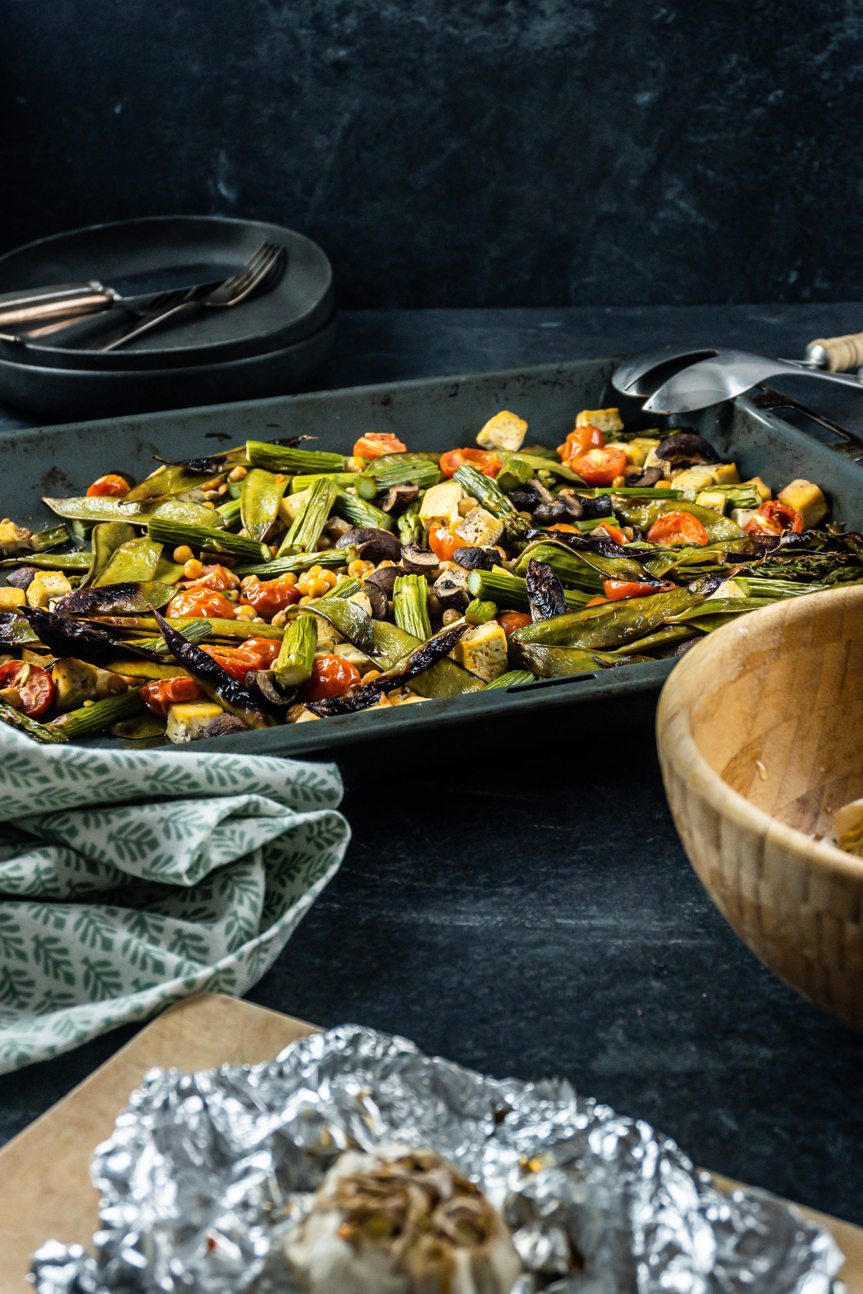 Spring Greens Oven Tray Bake with the spring greens being roasted on the tray shown in the picture