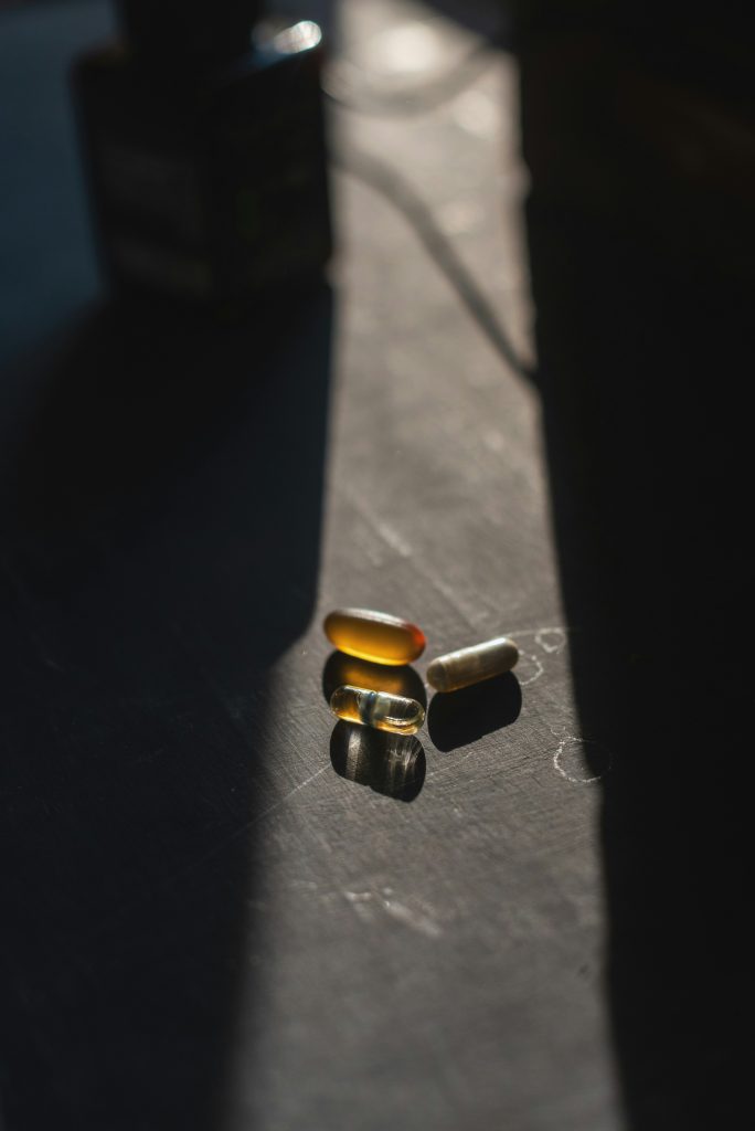 Different tablets being displayed in a beam of light for the post GLP-1 (Glucagon-like Peptide 1)
