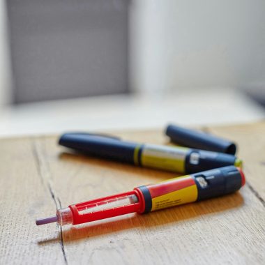 Pen injections laying on a table