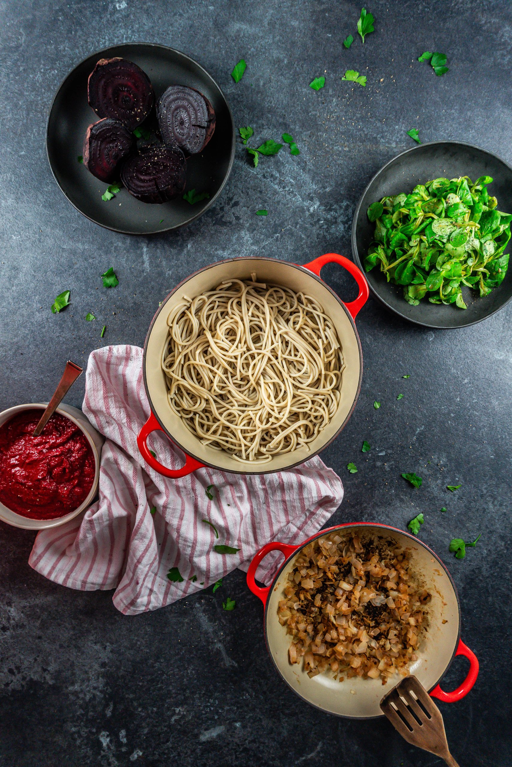 Beetroot, gluten-free noodles, fried onions, and creamy blender beetroot sauce ready to be mixed