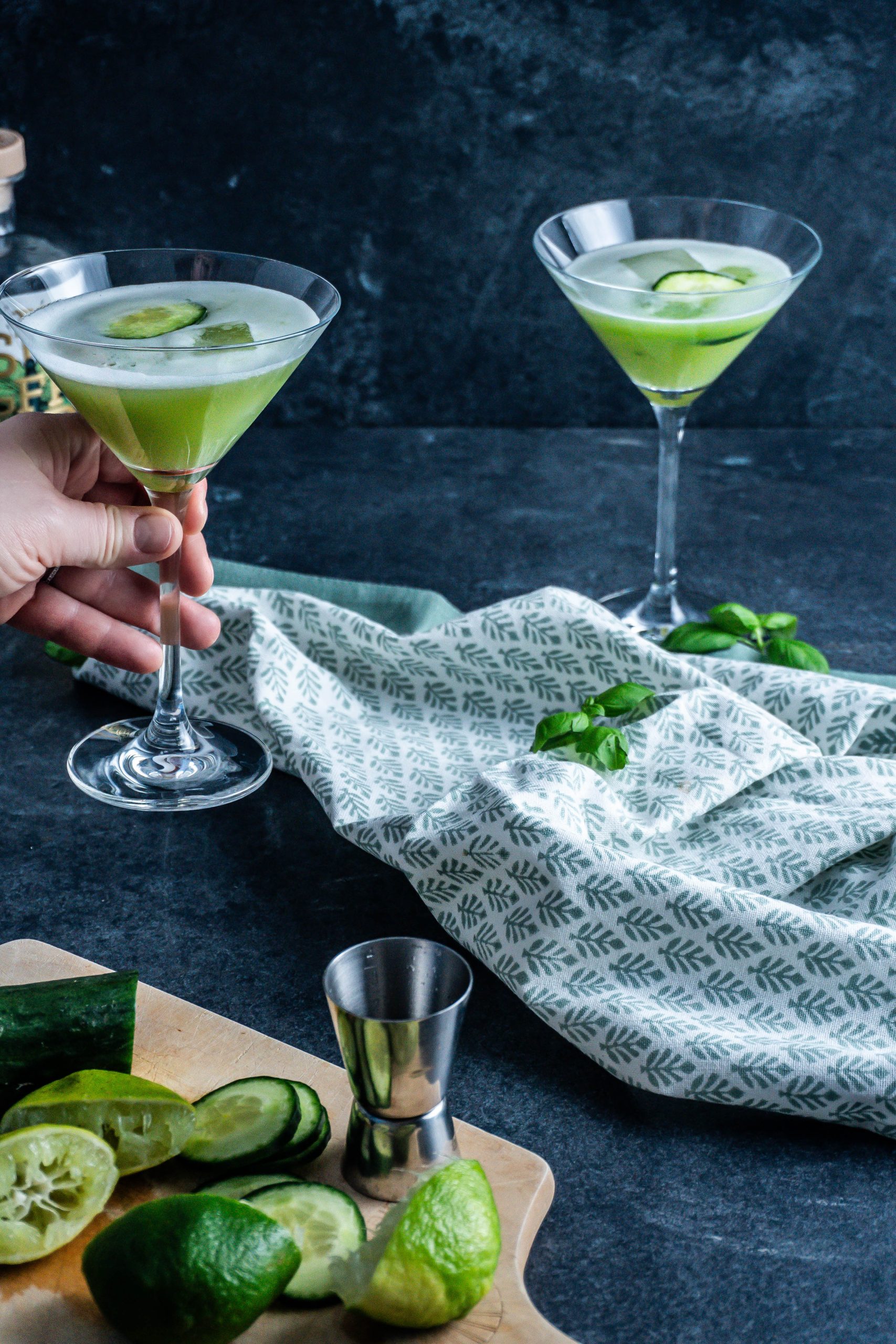 non-alcoholic garden sour cocktail being picked up ready for drinking