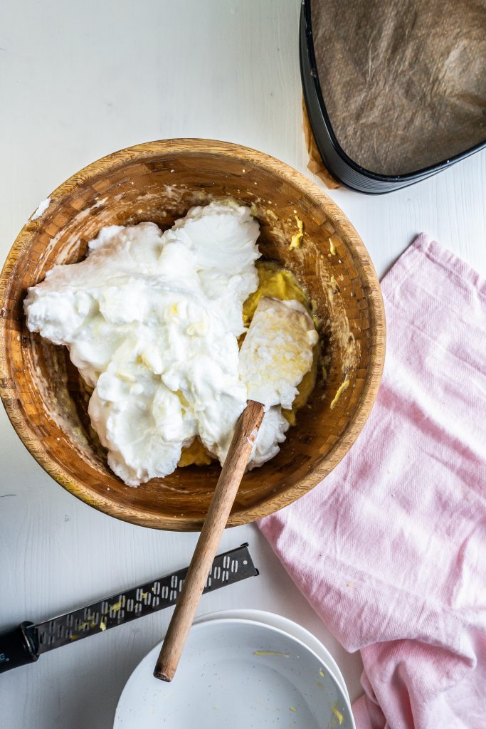 A batter of egg yolks, almonds, grated potatoes, and polenta is seeing added fluffed egg whites