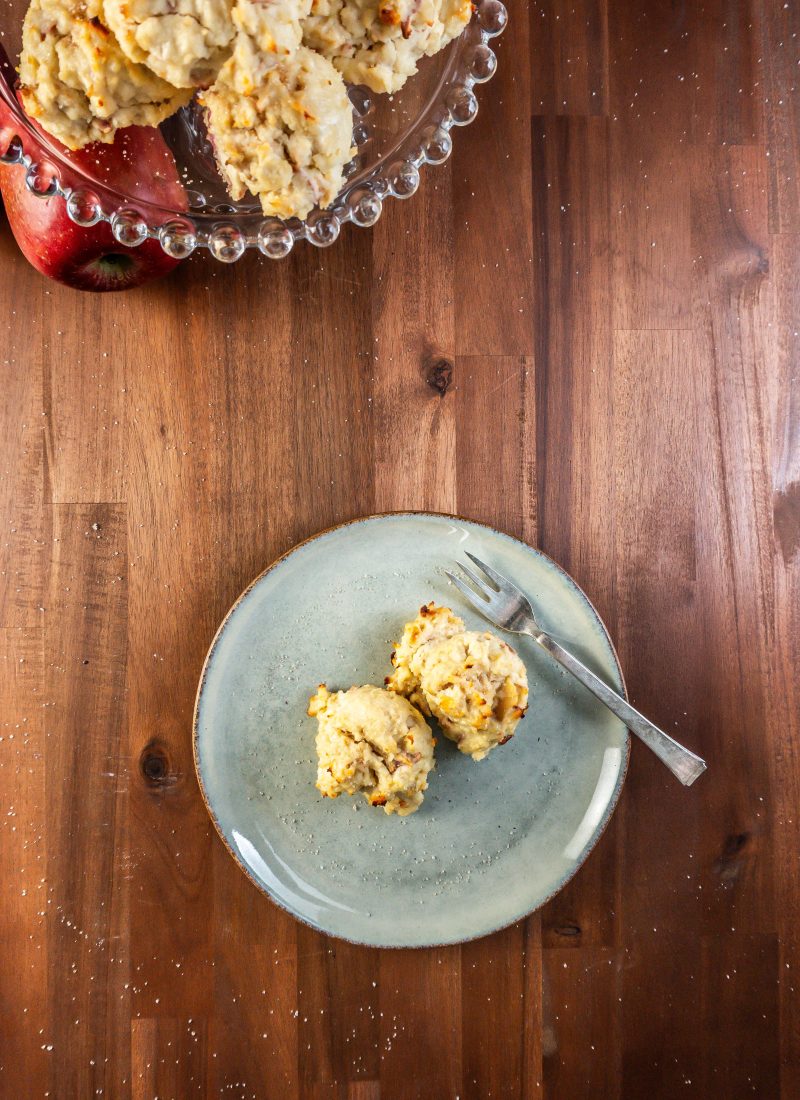 Mini Apple Quark Balls on a plate with some more balls being displayed on a cake stand visible in the background