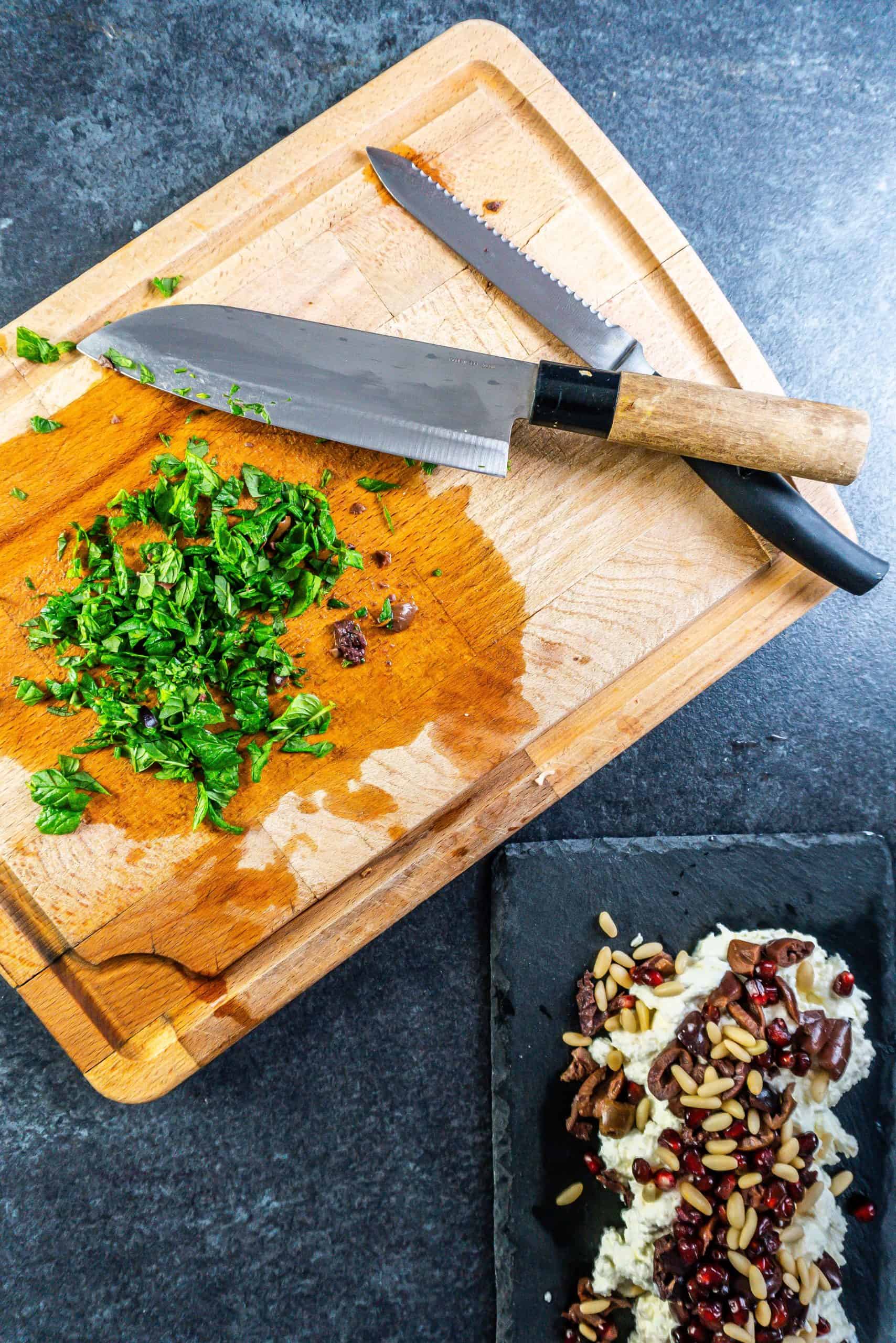 Chopping mint leaves for this creamy whipped feta dip