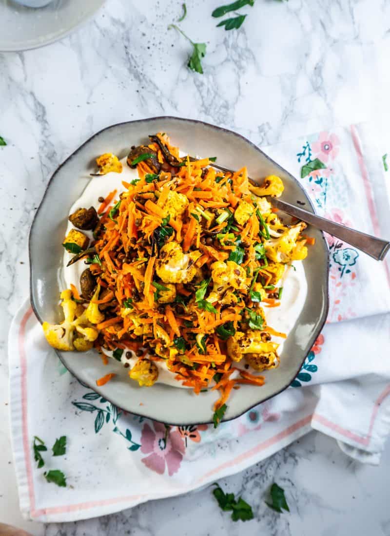 Roasted Cauliflower Salad on a plate with a fork stuck into it